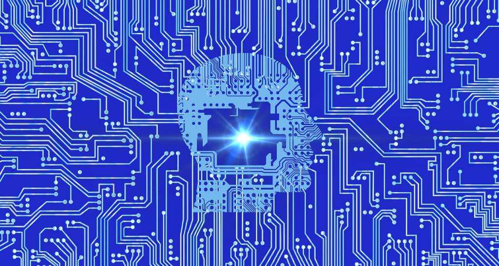 Circuits on a blue background with a human head outline