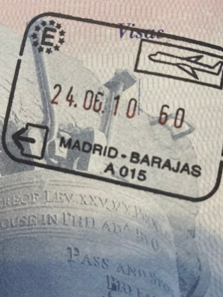A stamp from Madrid Barajas airport, dated June 24, 2010.